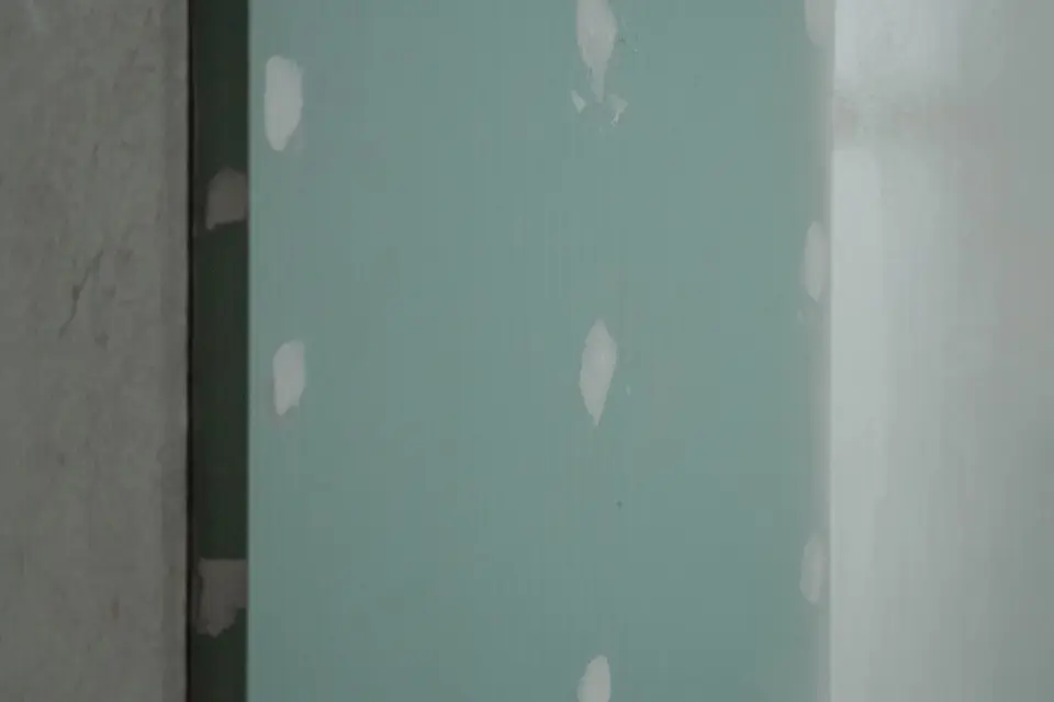 Example imagery: drywall with fresh patches, before paint