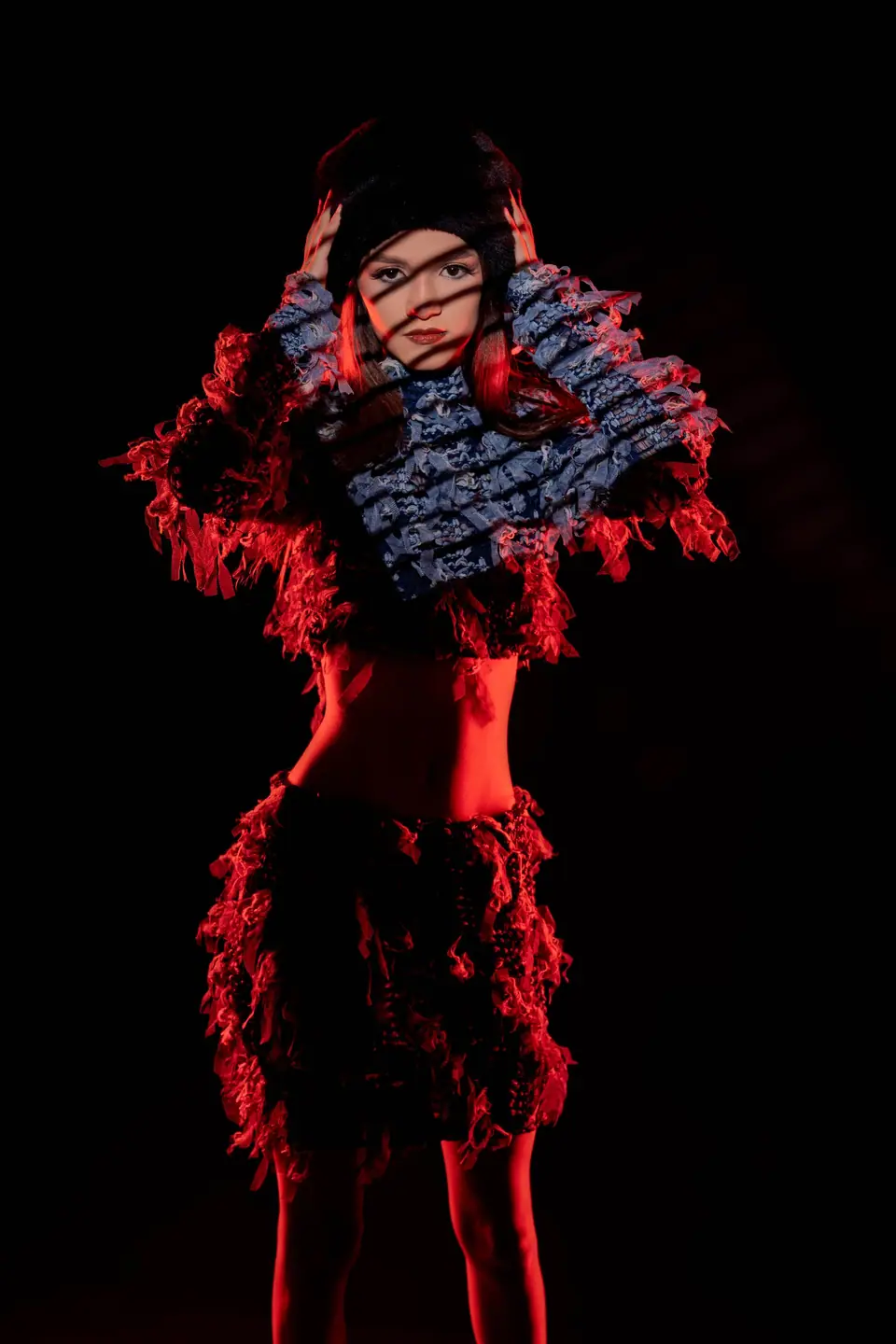 Fashion portrait under deep red light