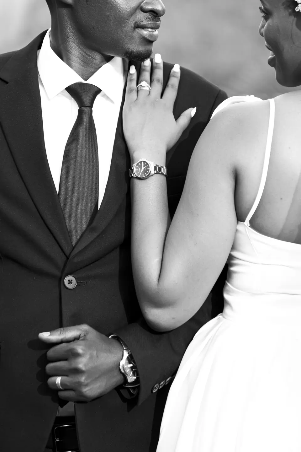 Couple in formal attire, cropped editorial frame, black and white
