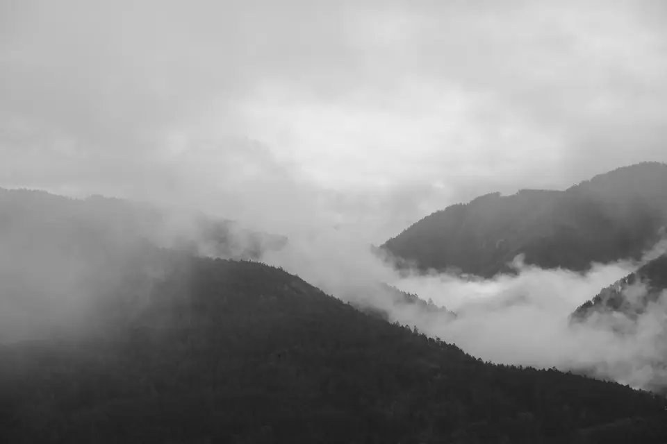 Misty mountains in black and white